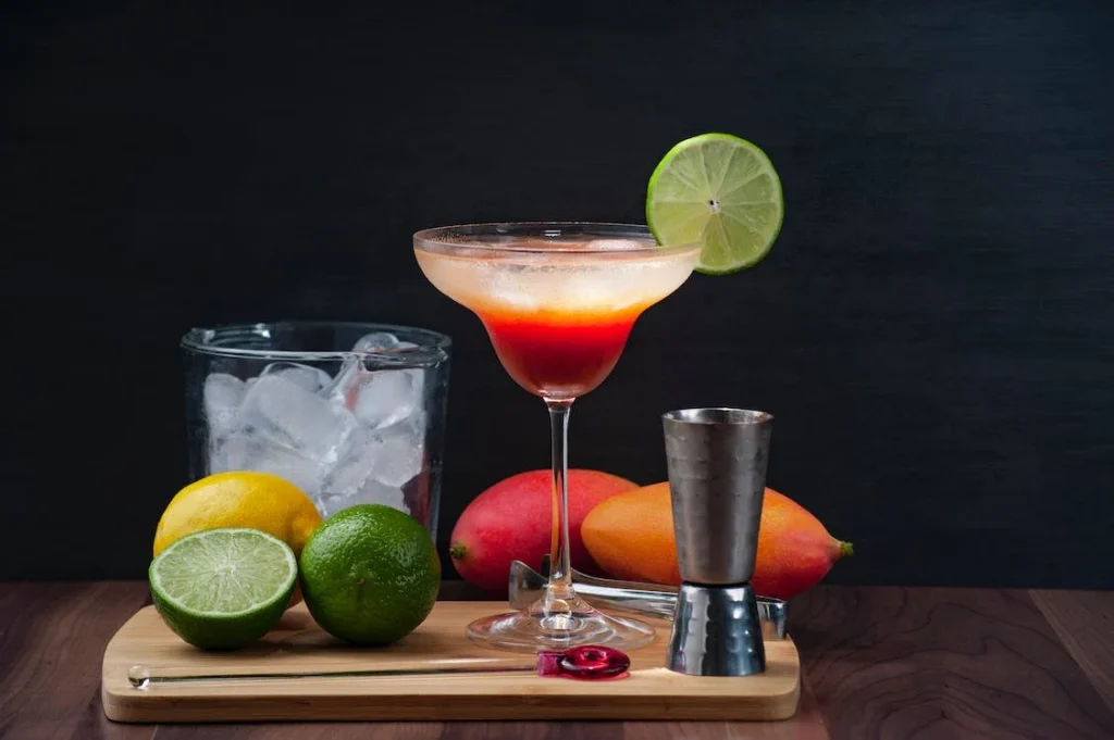 A colorful classic margarita garnished with a lime wheel, ready to be enjoyed with a variety of brunch dishes, showcasing the art of cocktail pairing.